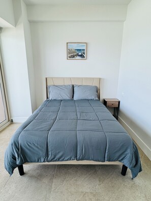 2 dormitorios, tabla de planchar con plancha, wifi gratis y ropa de cama