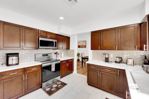 Remodeled; 8 min. to Strip; modern 4 BR 3 BA house; EV charging;  10,000 ft lot.