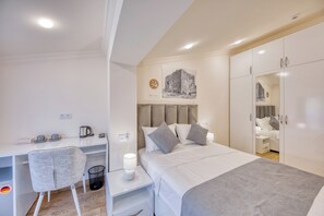 Standaard kamer | Hypoallergeen beddengoed, bedden met traagschuimmatrassen, een minibar
