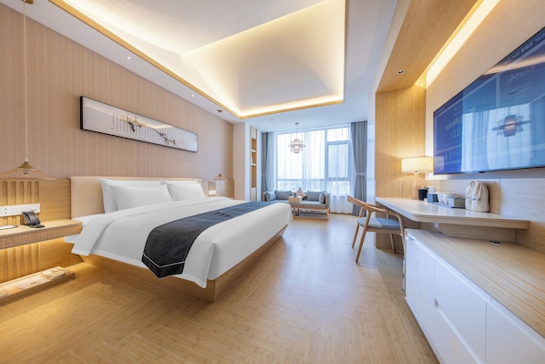 Habitación ejecutiva | Ropa de cama de alta calidad, edredón y artículos del minibar gratis