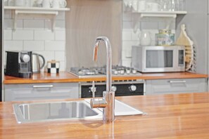 Luokittelematon kuva, 5 kautta 25, painike