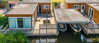 Spacious waterfront chalet including a sloop