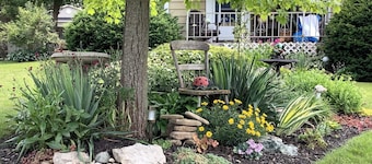 Doggy heaven. Large fenced yard , beautiful gardens, guest patio and firepit.