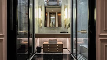 Deep-soaking bathtub, rainfall showerhead, hair dryer, bathrobes