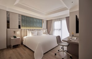 Luxe beddengoed, donsdekens, een minibar, een kluis op de kamer