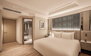 Roba de llit d'alta qualitat, cobrellits i minibar 