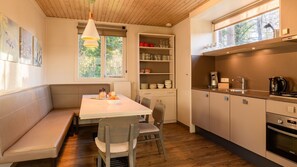 Fridge, stovetop, dishwasher, coffee/tea maker