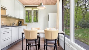 Fridge, stovetop, dishwasher, coffee/tea maker