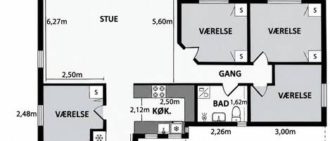 A floor plan of a hotel with a terrace, two ensuite rooms, a sauna, and a kitchen.