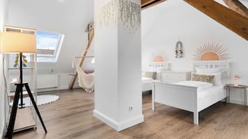 4 bedrooms, desk, iron/ironing board, travel crib