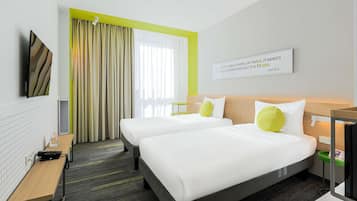 Standardrum - 2 enkelsängar | Minibar, värdeförvaringsskåp på rummet och skrivbord