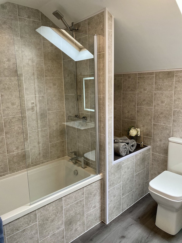 Hair dryer, towels, soap, shampoo