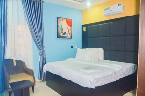 Classic Room, Courtyard View | Premium bedding, in-room safe, desk, laptop workspace - Kelvic Systems Apartments (Abuja)
