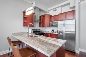 Fridge, microwave, oven, stovetop - Palatial 1BR with Rooftop Pool (Philadelphia)