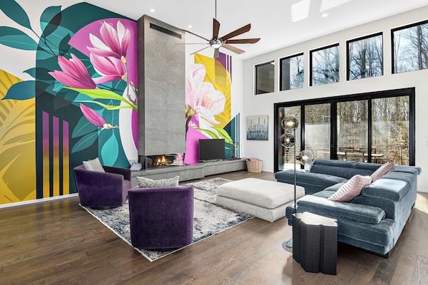 Beautiful murals adorn the walls of this home. They were painted by a local artist and painter currently based in Asheville, NC.