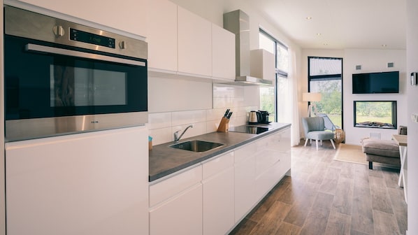 Fridge, coffee/tea maker, electric kettle, toaster