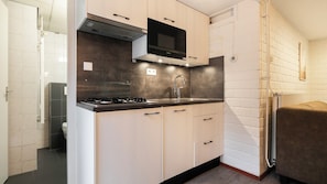 Fridge, coffee/tea maker, electric kettle, dining tables