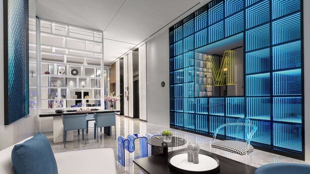 A modern hotel lobby with a central seating area, a reception desk, and a decorative wall with illuminated panels. - Microtel by Wyndham Xishuangbanna Mengle (Xishuangbanna Dai)