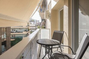 Apartamento conforto, vista para a cidade | Terraço/pátio