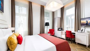 Luxe beddengoed, een minibar, een kluis op de kamer, geluiddichte muren