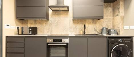 Apartment | Private kitchen | Fridge, microwave, oven, stovetop