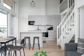 Appartement familial | Aire de séjour | Téléviseur à écran plat