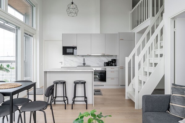 Family Apartment | Living area | Flat-screen TV