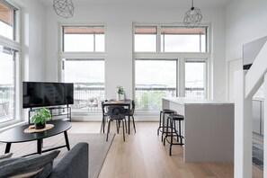 Appartement familial | Aire de séjour | Téléviseur à écran plat