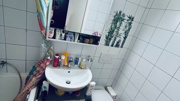Hair dryer, bidet, towels, soap