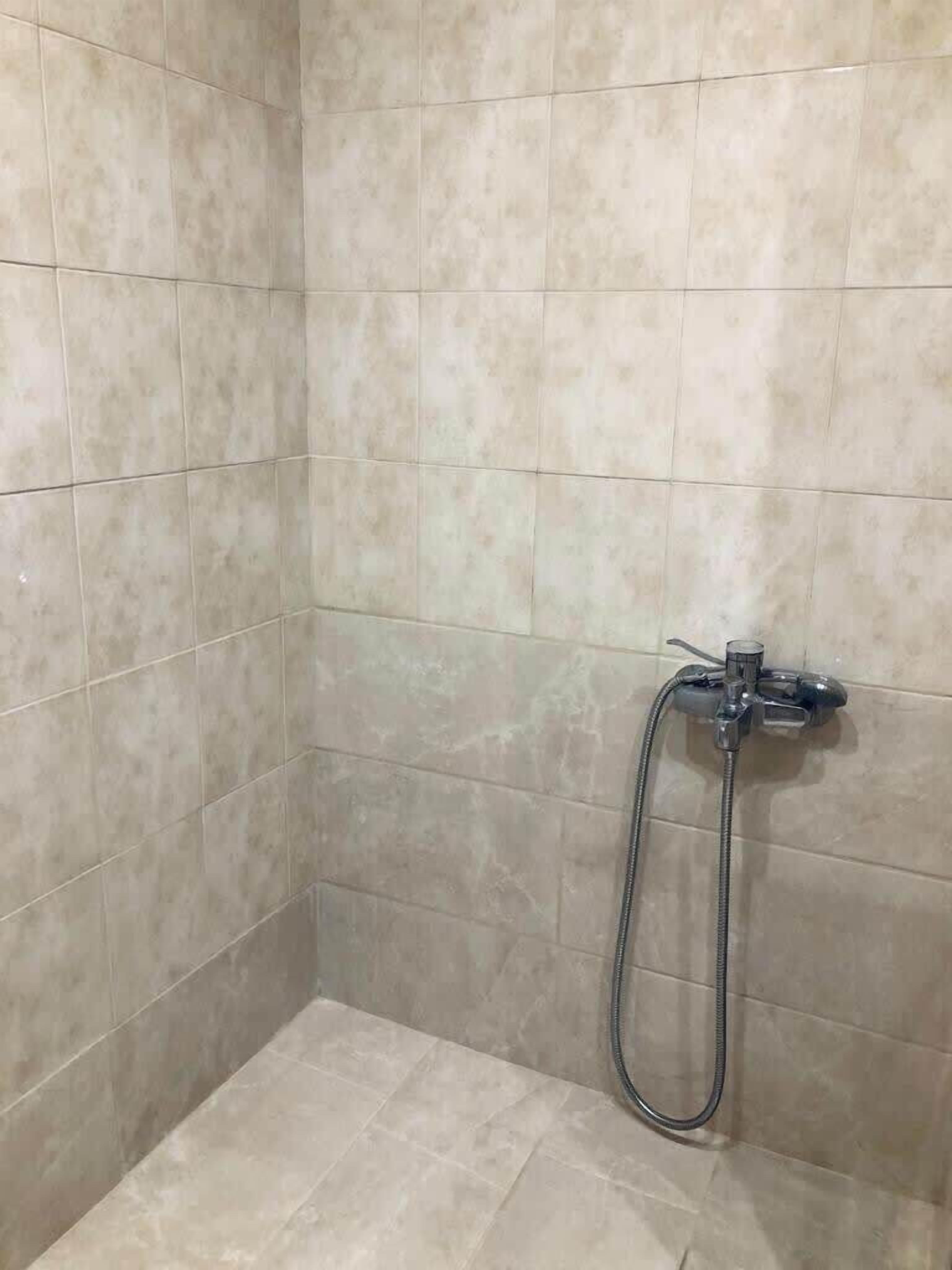 Ducha, toallas, shampoo