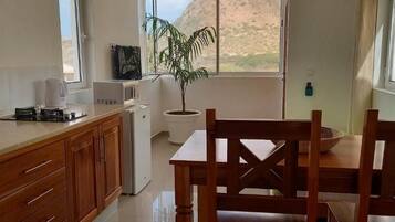 Apartment, 1 Bedroom, Non Smoking, Garden Area | Living area | 32-inch Smart TV with digital channels