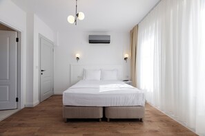 Habitación doble estándar | Ropa de cama de alta calidad, minibar, wifi gratis y ropa de cama