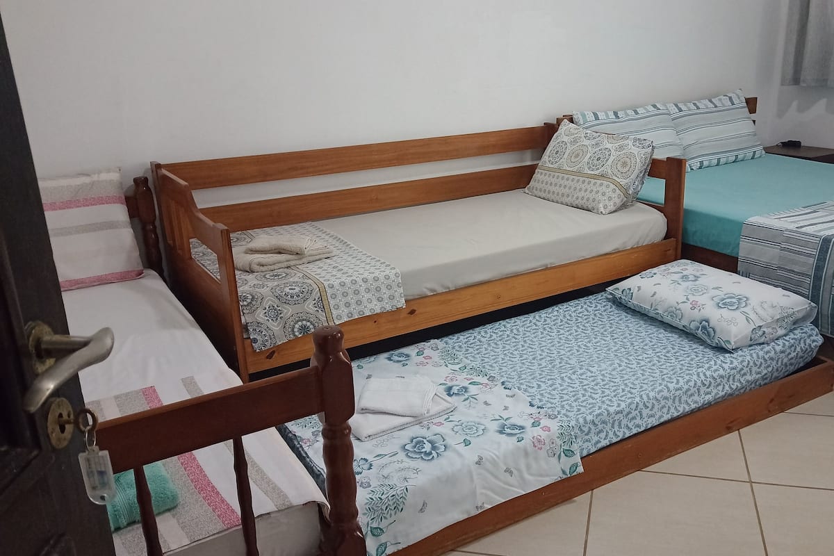 Family Suite, Garden View | 5 bedrooms, blackout curtains, iron/ironing board, free WiFi