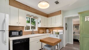 House, Multiple Beds, Kitchen, Garden View (629 Lesser Drive) | Private kitchen | Coffee/tea maker, fridge, microwave, oven - Old Town Retreat w/ Vintage Flair Near Csu, Bikes! (Fort Collins)