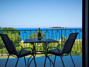Quarto casal, sacada, vista para o mar | Terraço/pátio