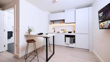Desk, laptop workspace, free WiFi, bed sheets