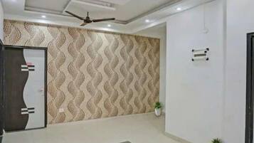 Deluxe Room, City View | 1 bedroom, in-room safe, desk, laptop workspace