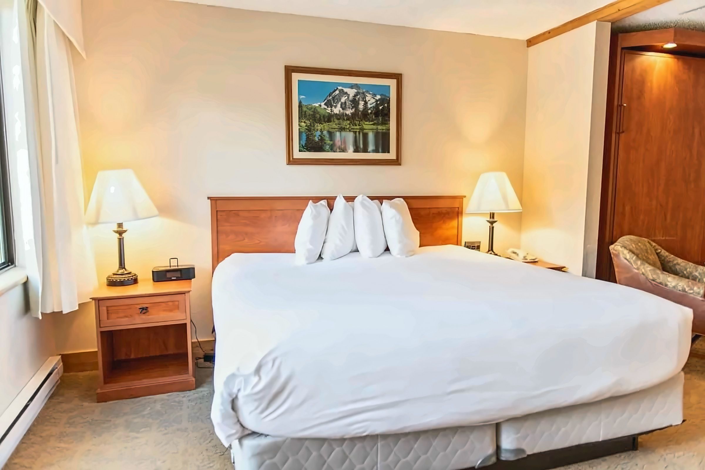 【Bedroom】King bed steps from the lifts — guests call it comfy