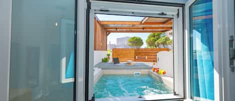 Suite Deluxe, hidromasaje, vista al patio | Vista desde la habitación