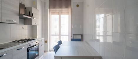 Fridge, microwave, oven, cookware/dishes/utensils