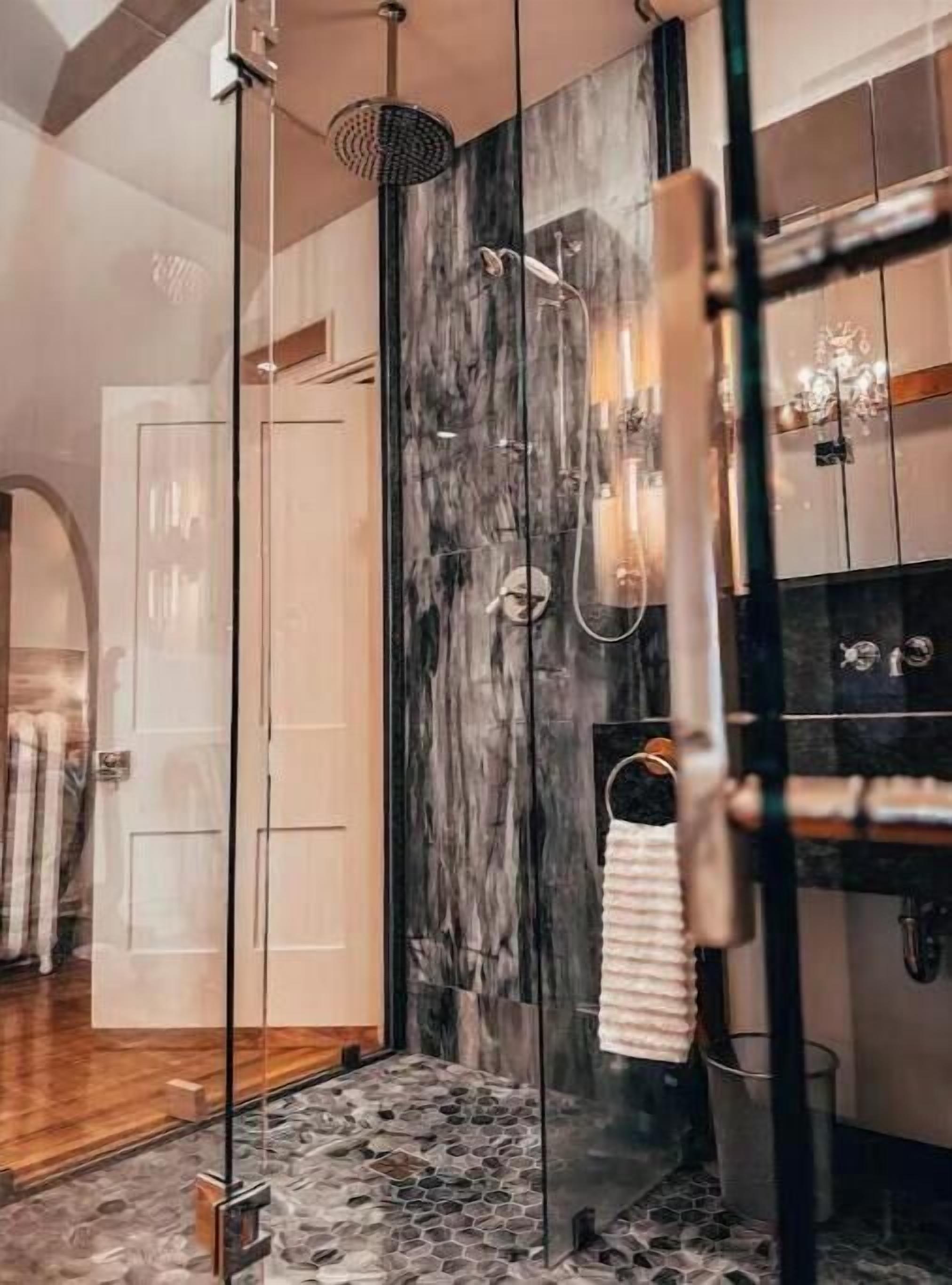Shower, eco-friendly toiletries, hair dryer, towels