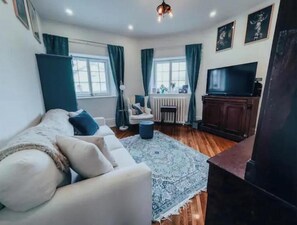 Smart TV, fireplace, table tennis, books
