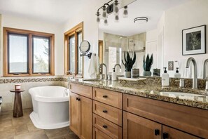 Shower, hair dryer, towels, shampoo