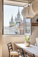 Family Apartment, 1 Bedroom | Living area | 50-inch Smart TV with cable channels