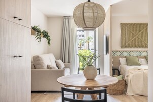 Studio | Living area | 50-inch Smart TV with cable channels