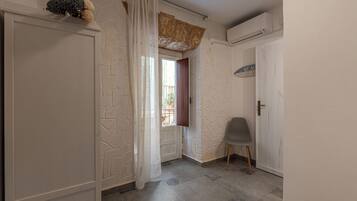 Apartment | Living area | 32-inch flat-screen TV with cable channels