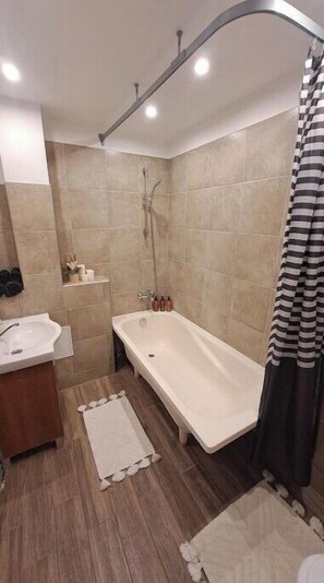 Hair dryer, towels, soap, shampoo
