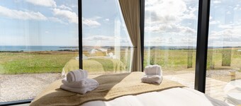 TYNE - OOD MIRROR HOUSES AT ARBIKIE DISTILLERY WITH SAUNA, 
LUNAN BAY, SCOTLAND