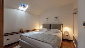 Apartment, City View | 2 bedrooms, desk, laptop workspace, iron/ironing board