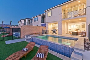A heated pool - Luxe Lakefront Villa: Views, Heated Pool & Games (Indio)